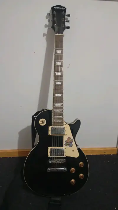Guitarra eléctrica Freeman negra modelo Les Paul - miniatura 1