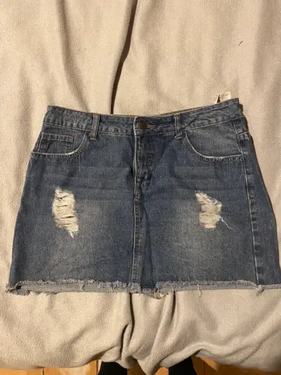 Mini falda denim rasgada - miniatura 1