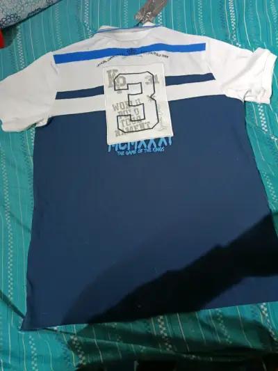 Polera polo azul con estampado - miniatura 2