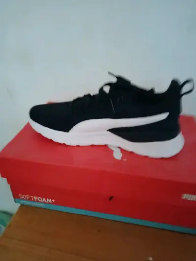 Zapatillas deportivas negras Puma - miniatura 1