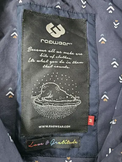 Chaqueta azul con capucha - miniatura 2