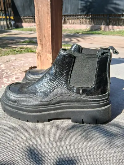 Botines negros de cuero - miniatura 1