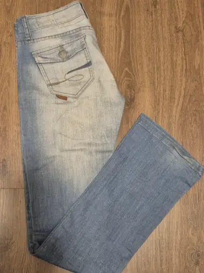Jeans azul claro desgastados - miniatura 1