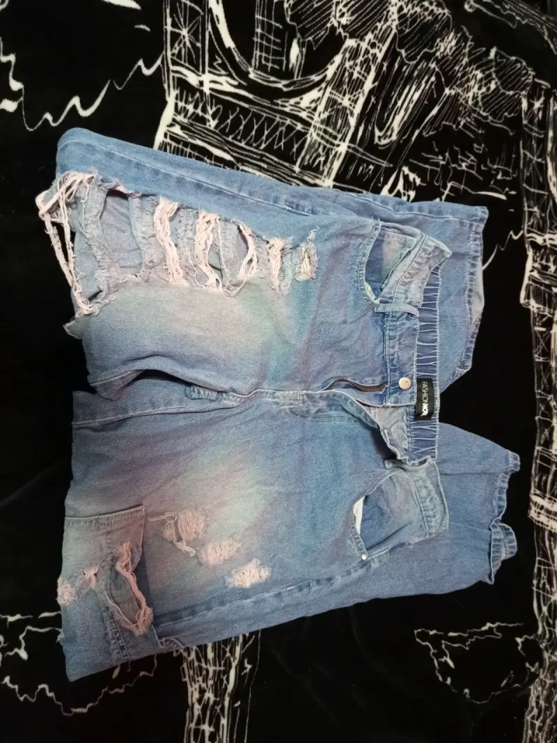 pantalon de mezclilla desgastados - 1