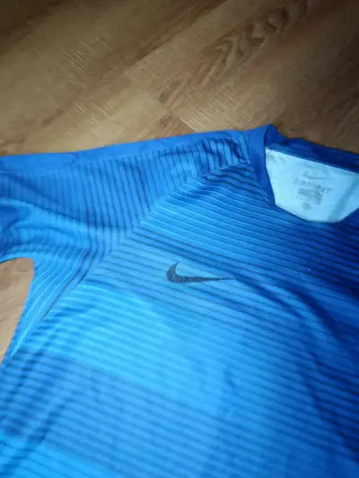 Polera deportiva azul Nike - miniatura 1