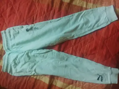 Pantalones deportivos Puma celeste - miniatura 1