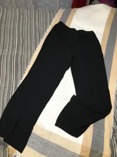 Pantalones negros tela con botones - miniatura 1