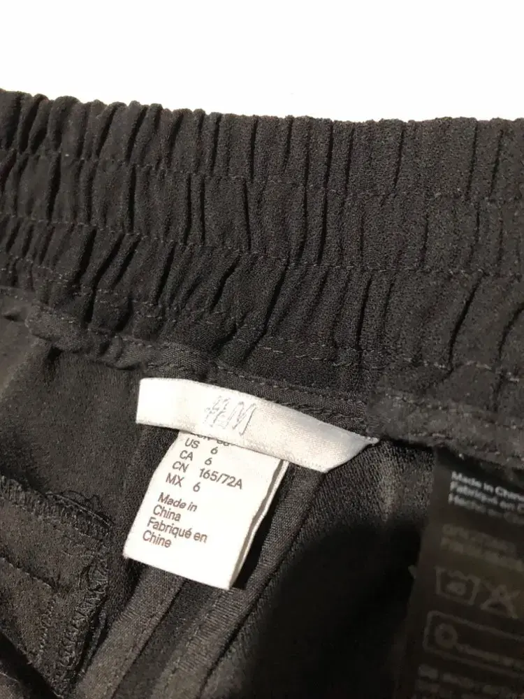 Pantalones negros tela con botones - 3
