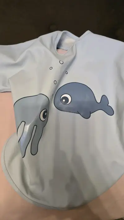 Babero impermeable con dibujos - miniatura 1