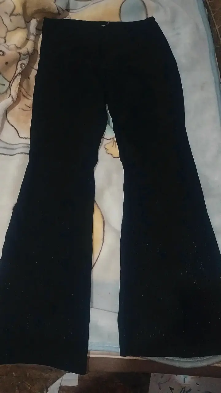 Pantalones negros acampanados - 1