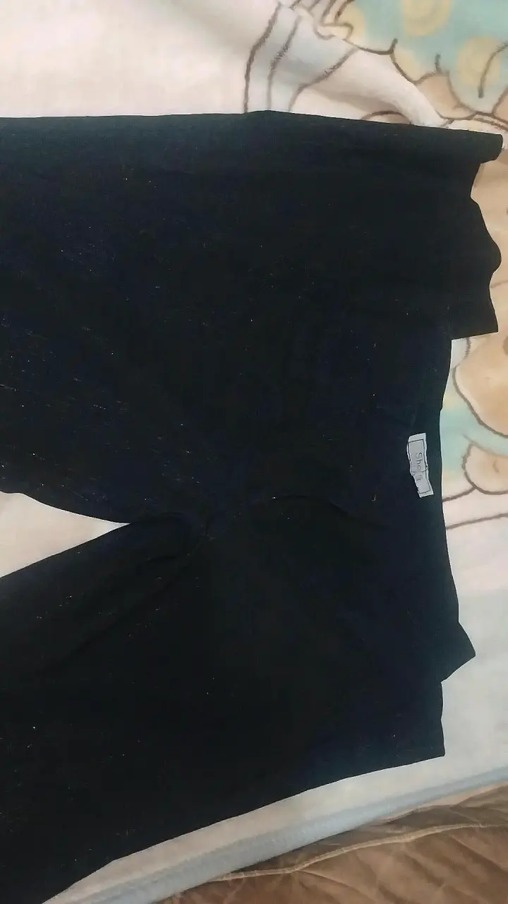 Pantalones negros acampanados - 2