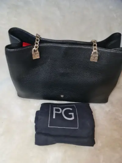 Cartera negra elegante con cadena - miniatura 1