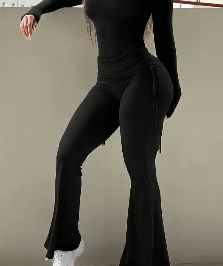 Pantalones acampanados negros - 1