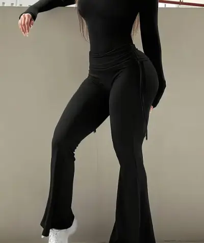 Pantalones acampanados negros - miniatura 1