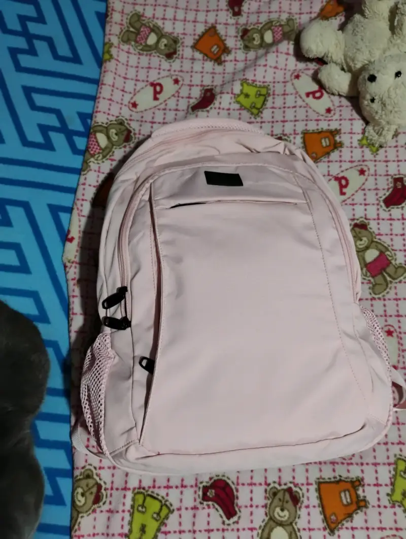 Mochila rosada con bolsillos - 1