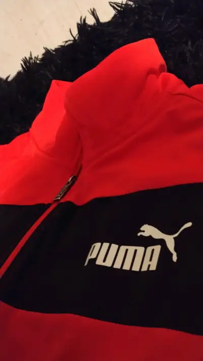 Chaqueta deportiva roja y negra Puma - miniatura 1