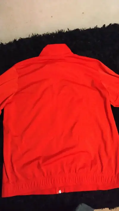 Chaqueta deportiva roja y negra Puma - miniatura 5
