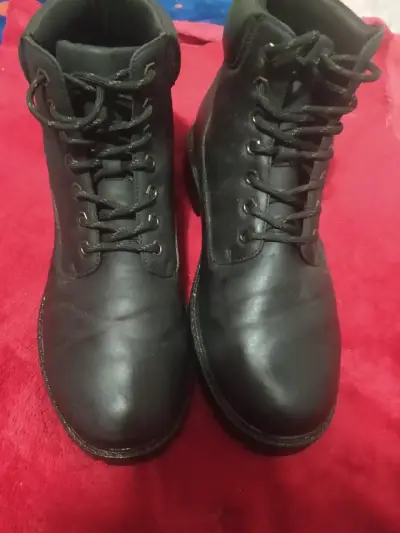 Botas negras de cuero - miniatura 1
