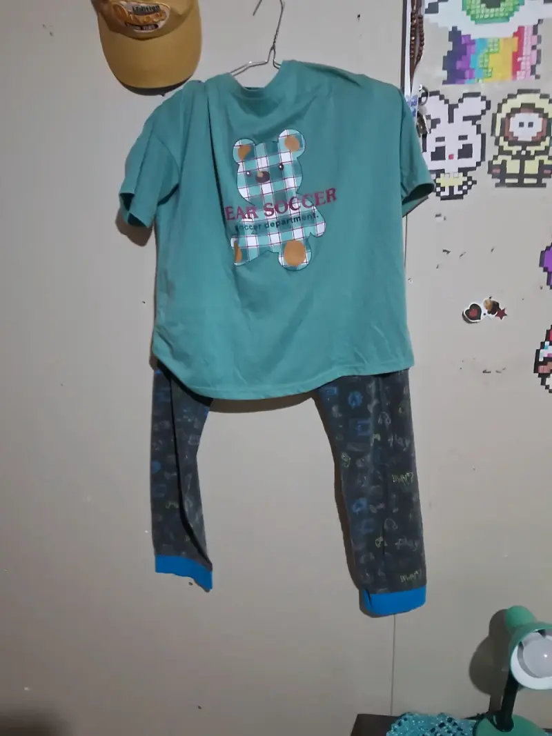 Pijama infantil verde estampado