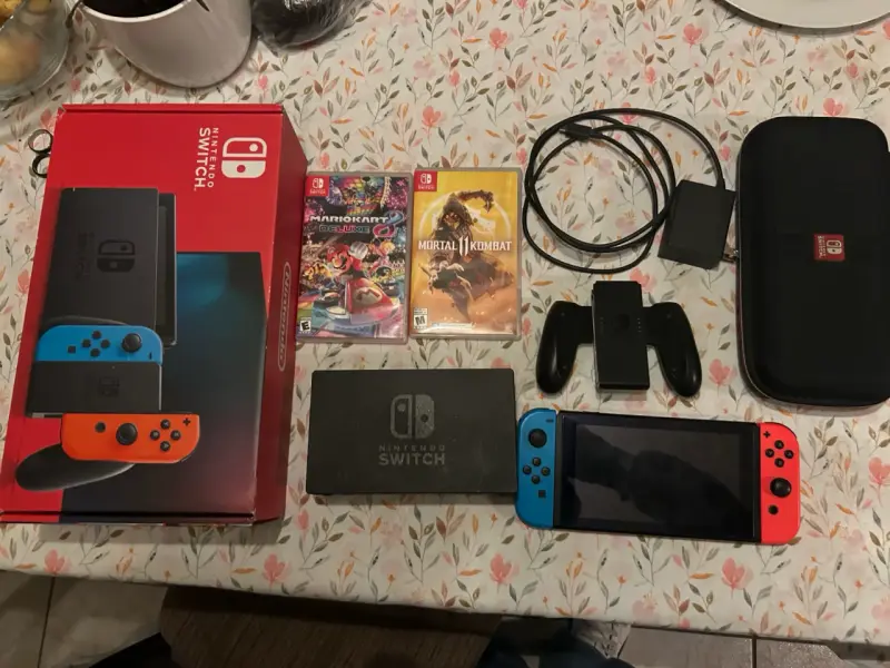Nintendo Switch con juegos y accesorios - 1