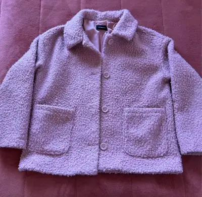 Chaqueta de lana rosada - miniatura 1