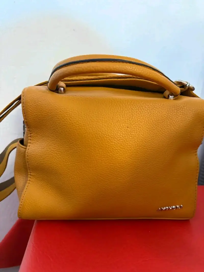 Carteras y mochila - 1