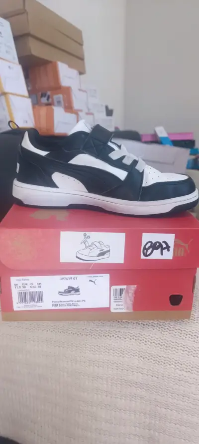 Zapatillas Puma blancas y negras - miniatura 2