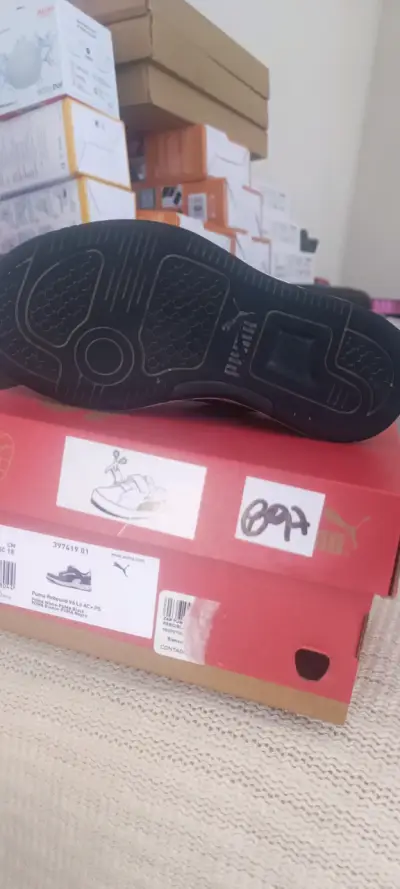 Zapatillas Puma blancas y negras - miniatura 3