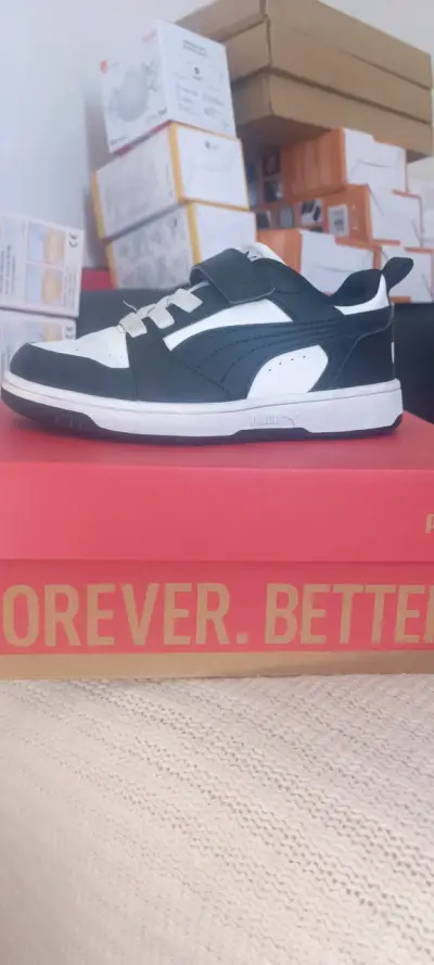 Zapatillas Puma blancas y negras - miniatura 4