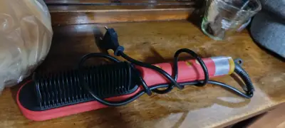 Vendo cepillo alisadora,y zapatitos de mujer N°18 - miniatura 1