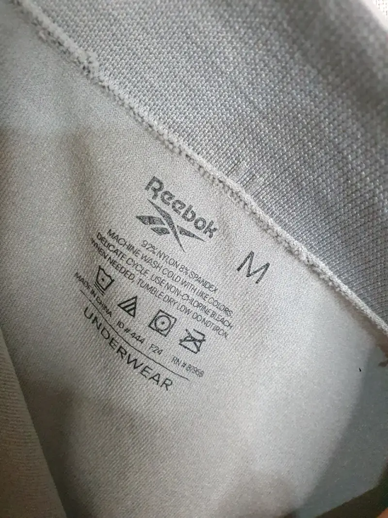 Shorts deportivos gris Reebok - 3
