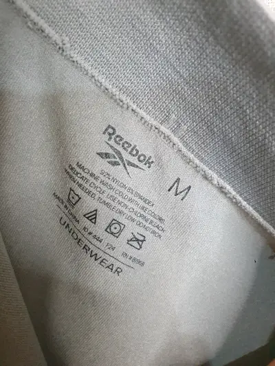Shorts deportivos gris Reebok - miniatura 3