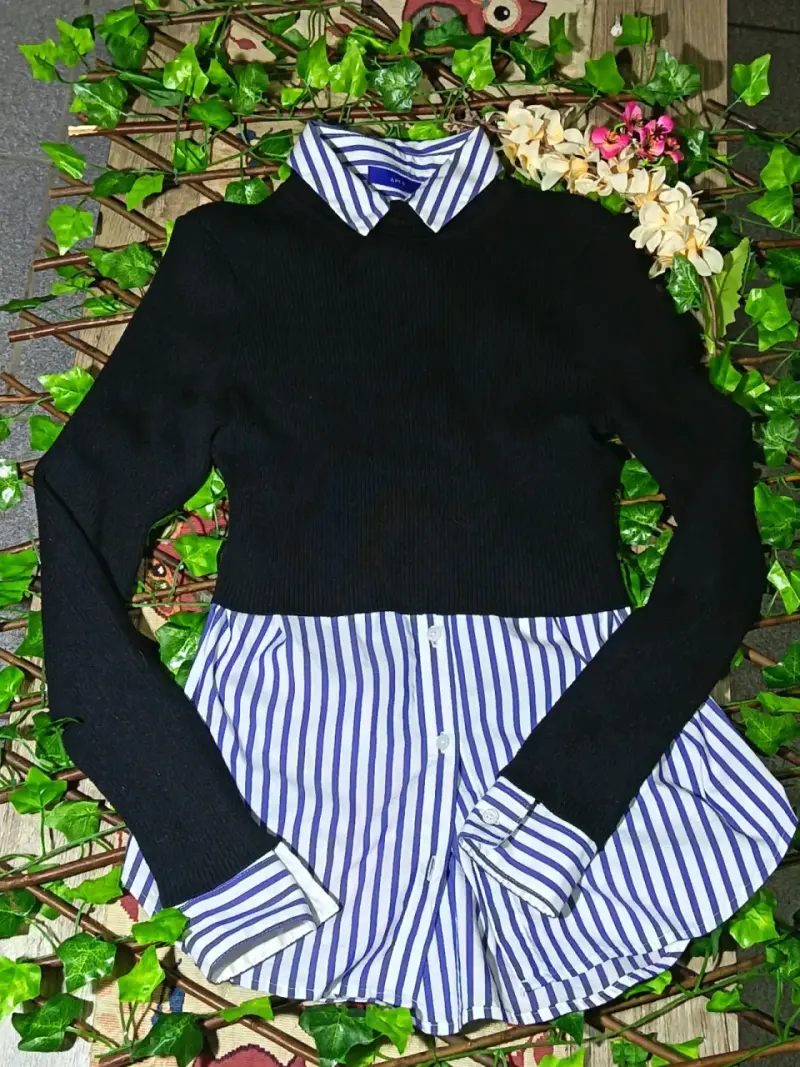 Blusa y suéter combinados