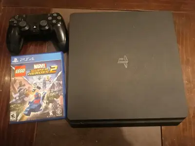 PlayStation 4 con control y juego - miniatura 1
