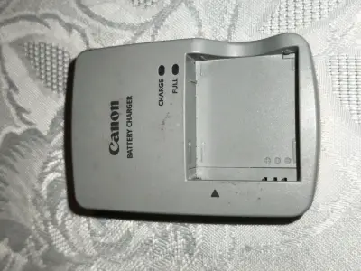 Cargador de baterías Canon - miniatura 1