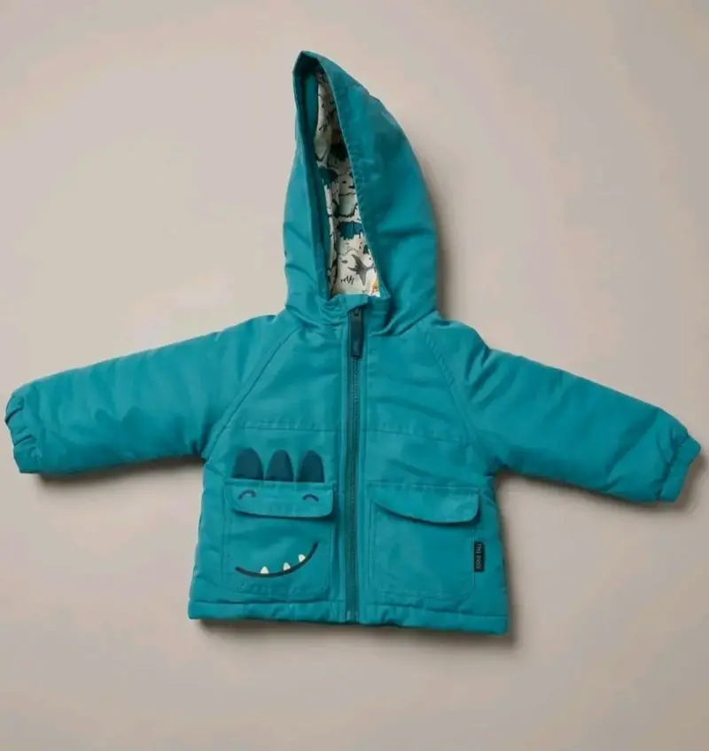 Parka infantil turquesa con capucha impermeable