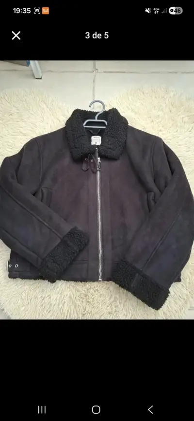 Chaqueta negra con chiporro - miniatura 1