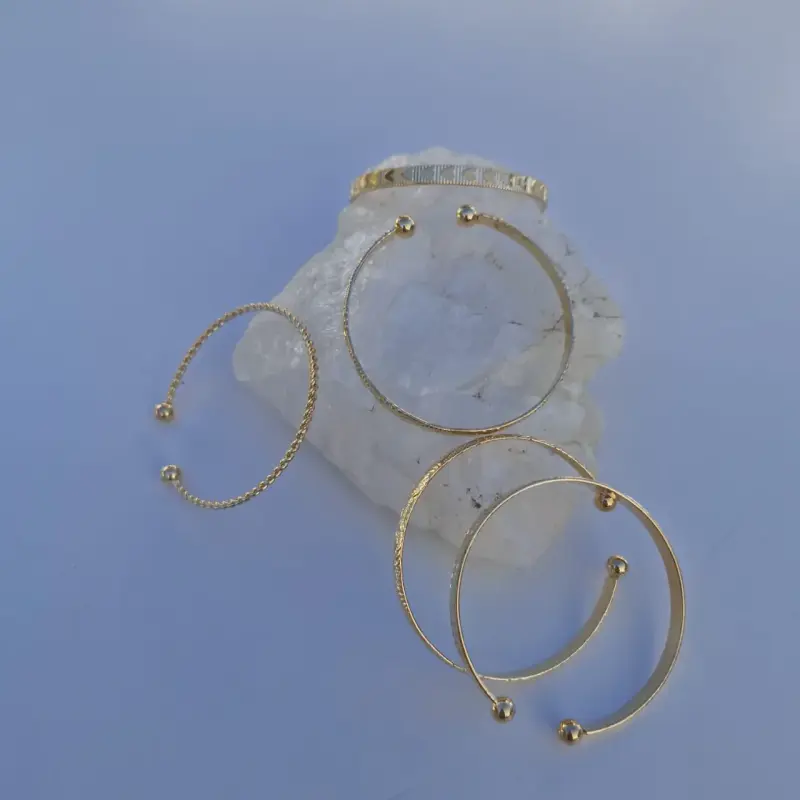 pulsera esclava abierta acero inoxidable dorada