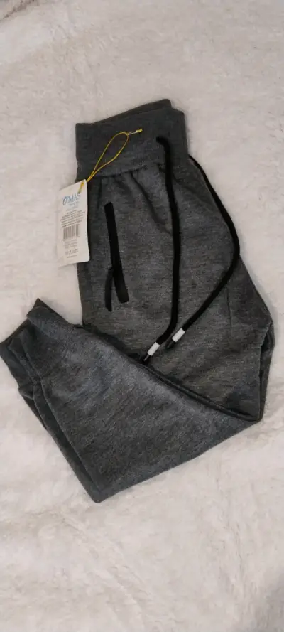 Pantalones deportivos gris oscuros nuevos - miniatura 2