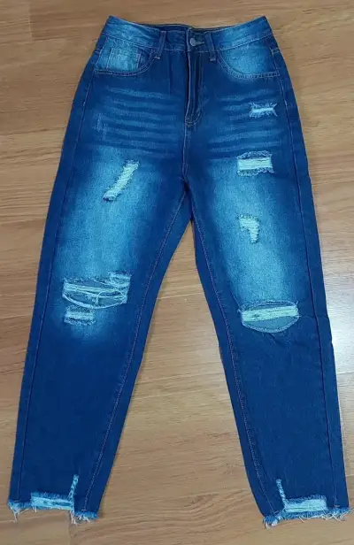 Jeans con desgaste azul - miniatura 1