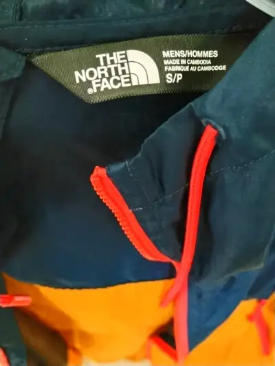 Chaqueta The North Face azul y naranja - miniatura 1
