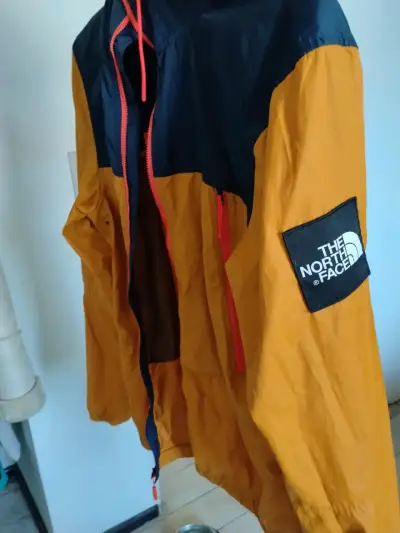 Chaqueta The North Face azul y naranja - miniatura 3