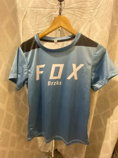Polera deportiva celeste FOX mujer talla S. - miniatura 1