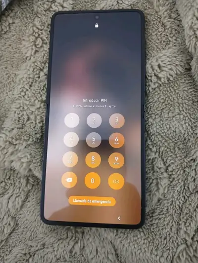 Teléfono plegable negro usado - miniatura 4