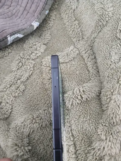 Teléfono plegable negro usado - miniatura 6