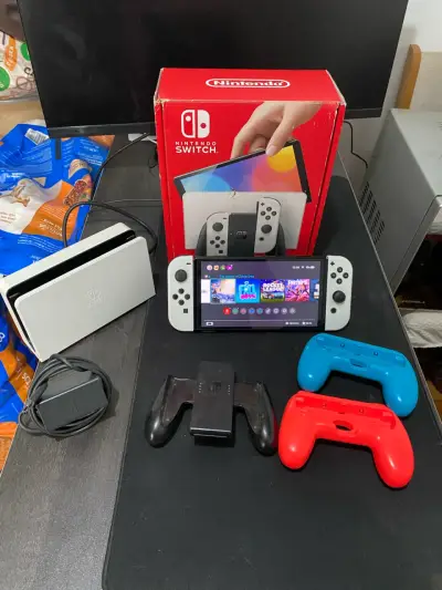 Consola Nintendo Switch Oled con accesorios - miniatura 1