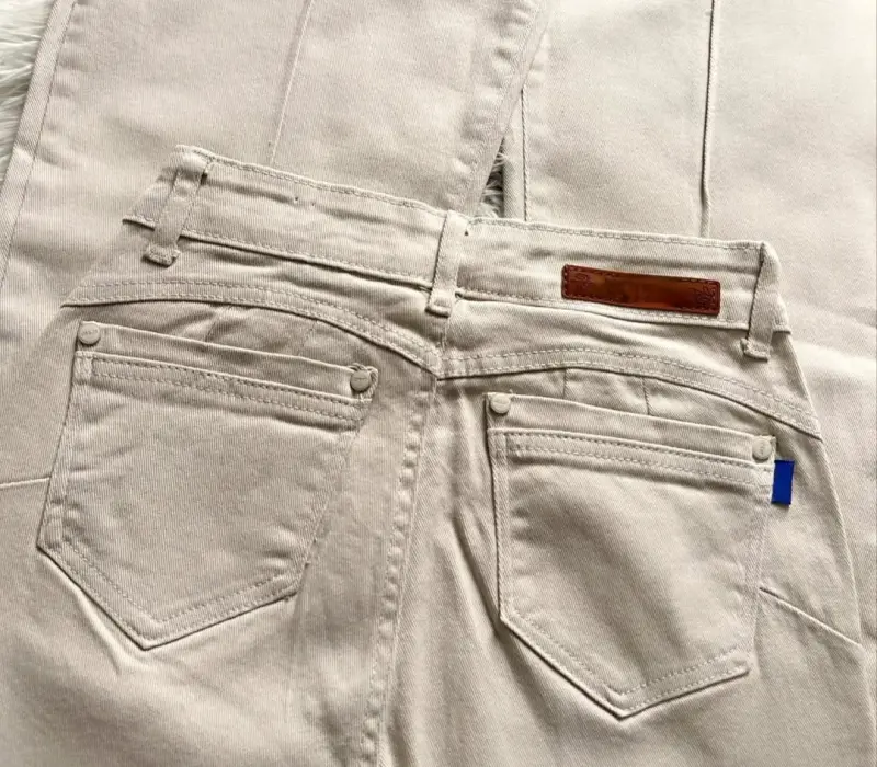 Pantalones acampanados beige - 2