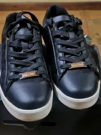 Zapatillas negras de cuero - miniatura 1