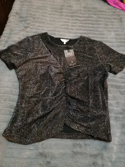 Polera brillante negra tamaño M - miniatura 1