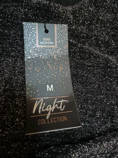 Polera brillante negra tamaño M - miniatura 3
